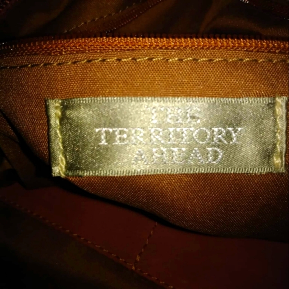 The territory Ahead brown leather purse